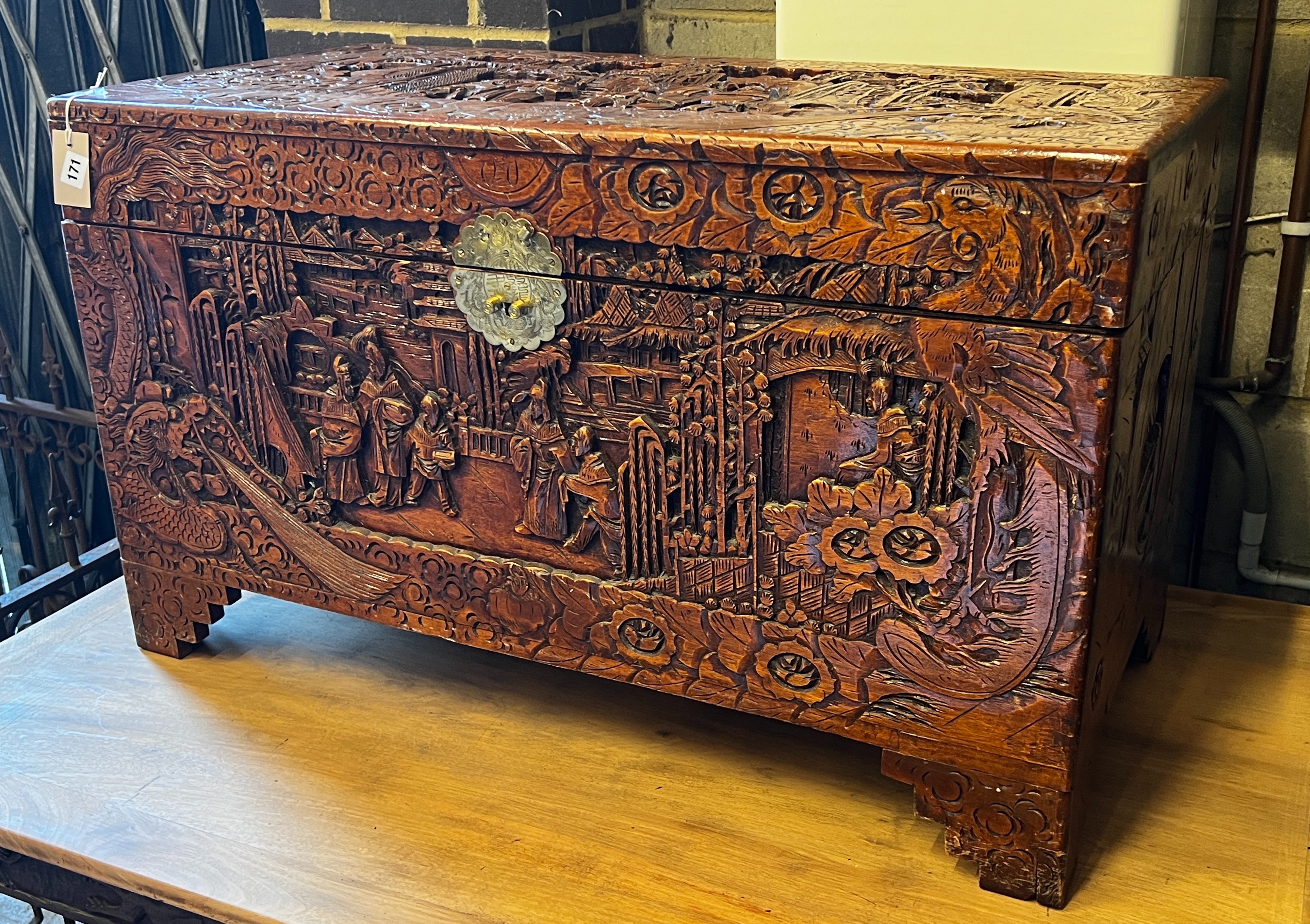 A Chinese carved camphorwood trunk, length 100cm, depth 50cm, height 60cm